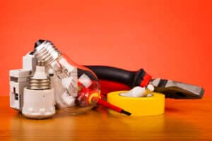 Composition of electrician's tools, emphasizing electrical considerations.
