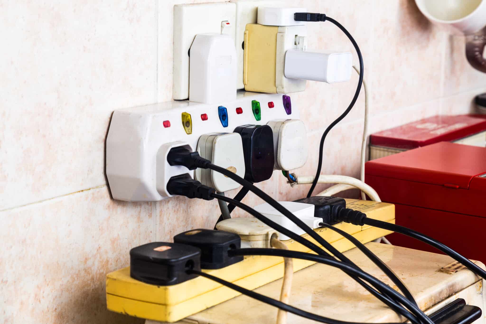 Using multiple plugs on one adapter can lead to electrical problems, as it risks overloading and can be dangerous.