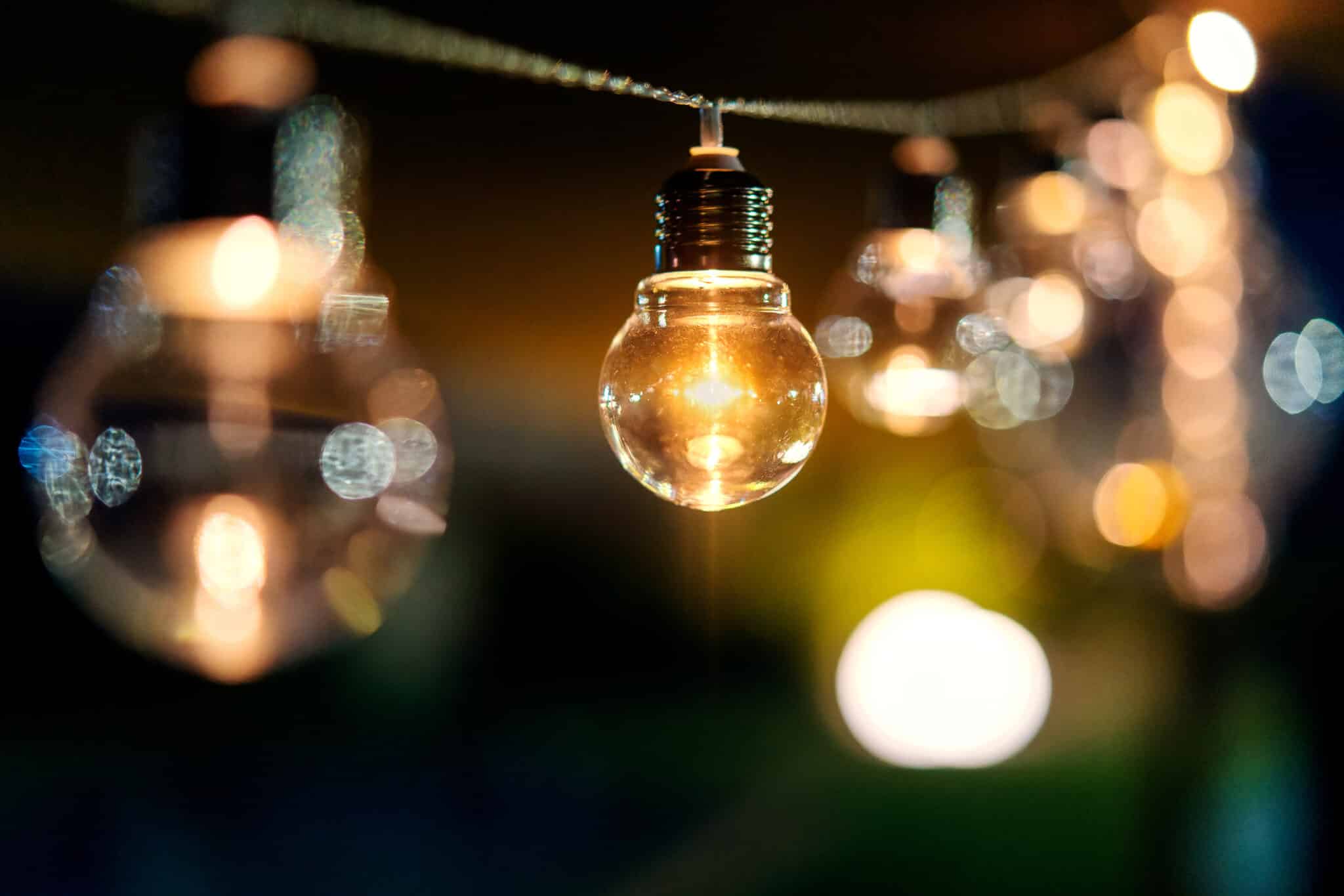 String lightbulbs used as outdoor lighting for background decoration.