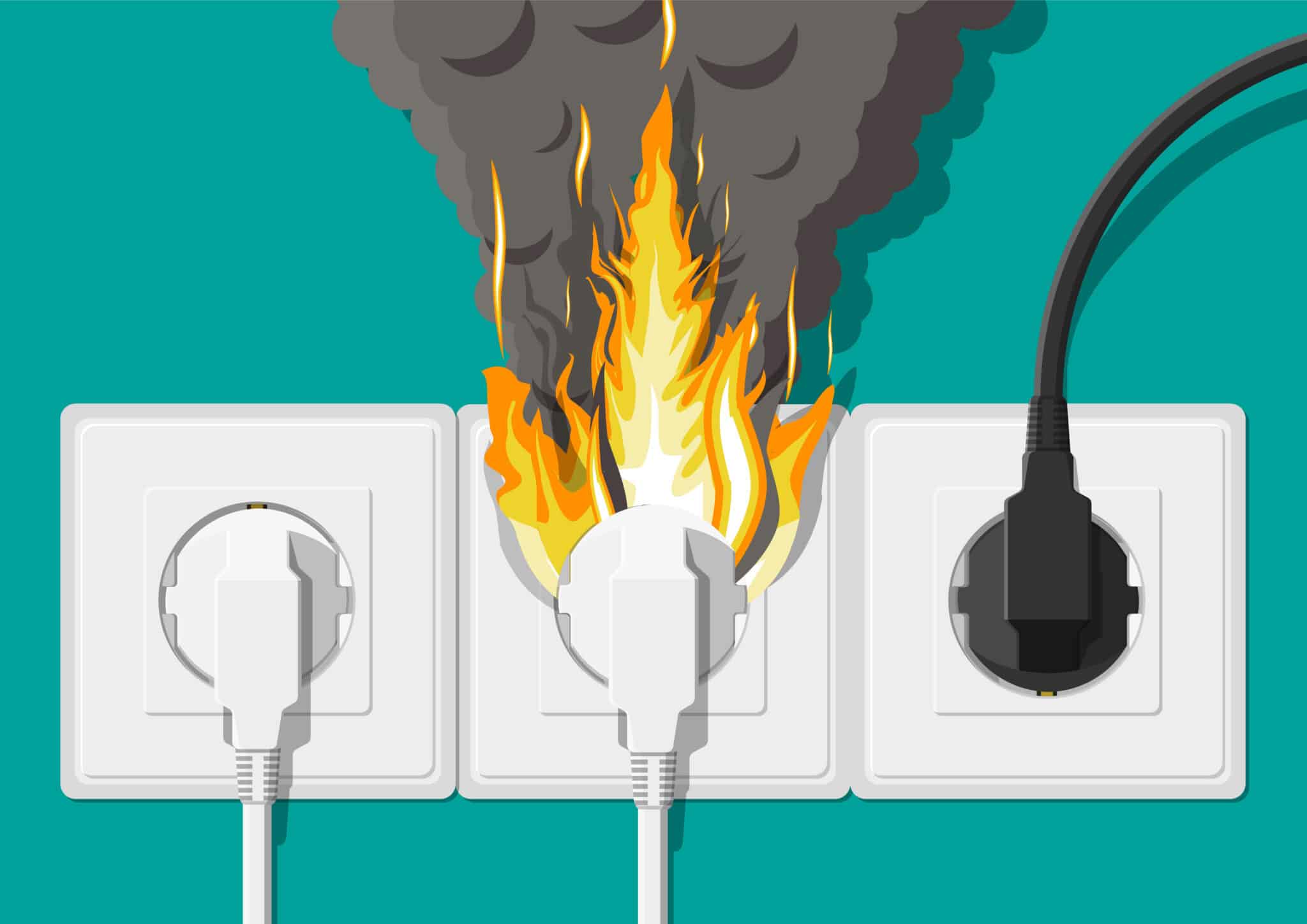 Electrical outlet on fire. Overloading, Electrical Wiring Standards.